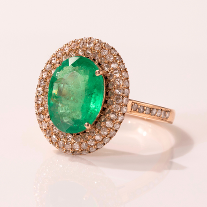 Oval Emerald Ring with Diamond Halo