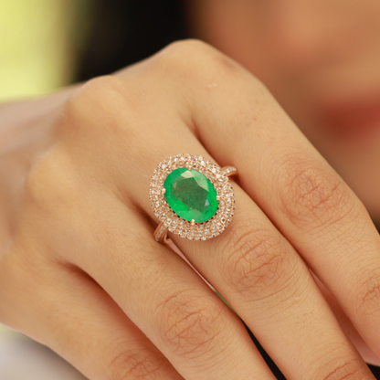 Oval Emerald Ring with Diamond Halo